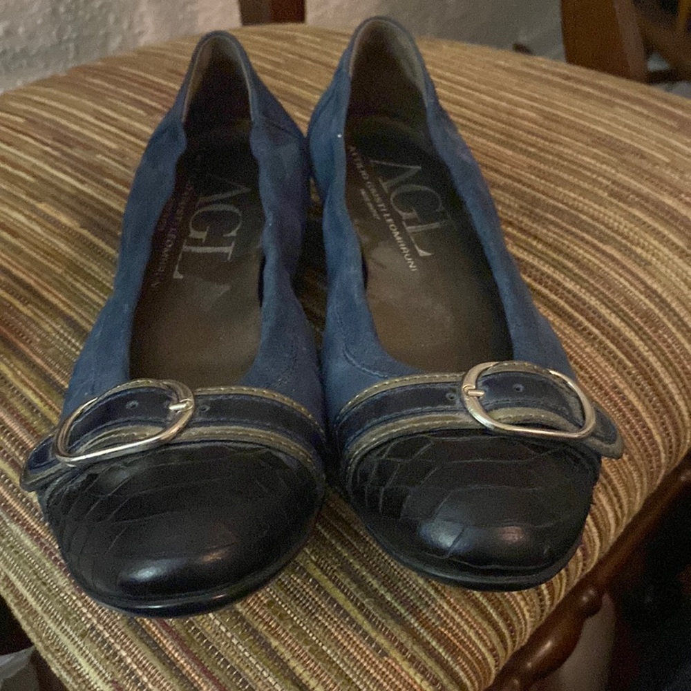 Blue ballet loafers with a accent buckle